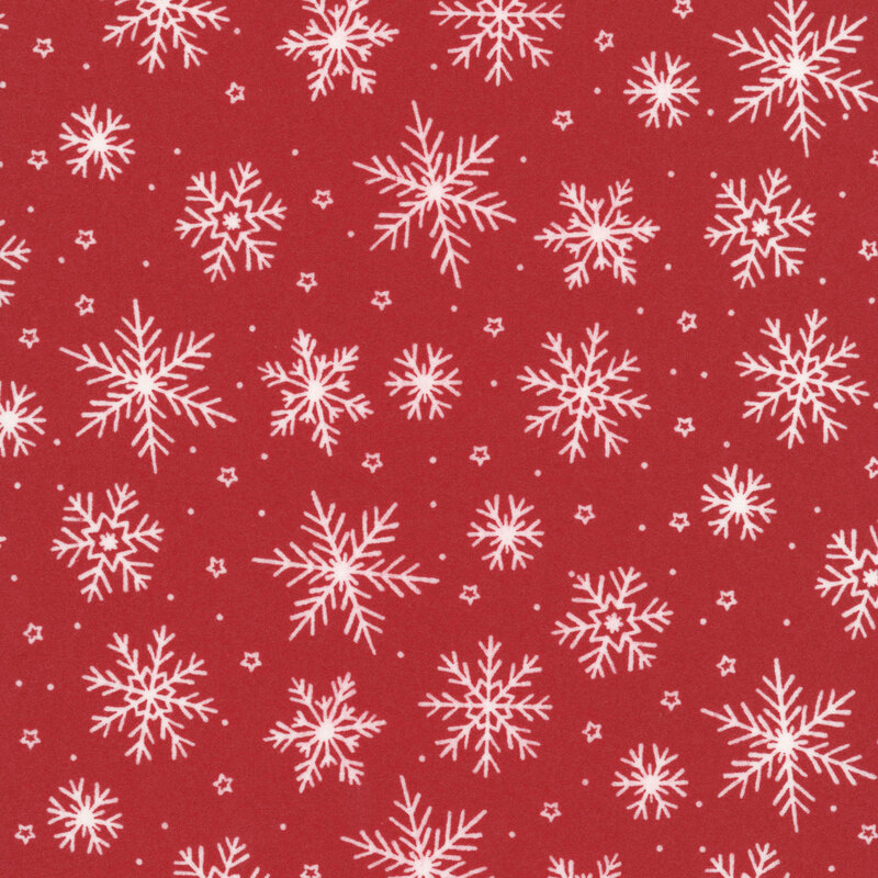 A tomato red fabric with tossed white snowflakes. 