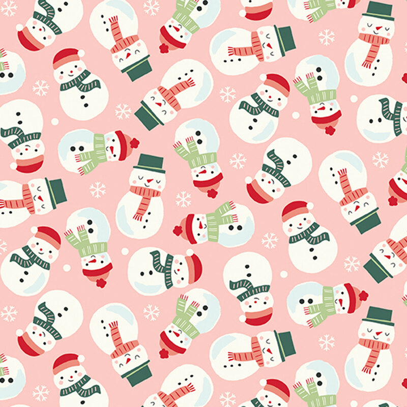 A blush pink fabric with tossed snowmen wearing scarves and hats. 