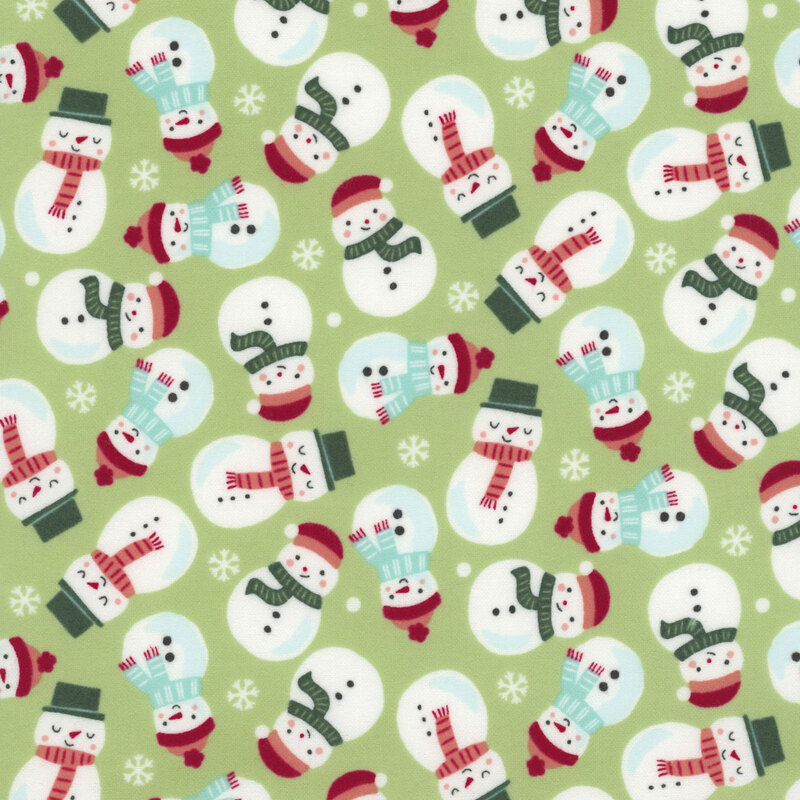 A light green fabric with tossed snowmen wearing scarves and hats. 