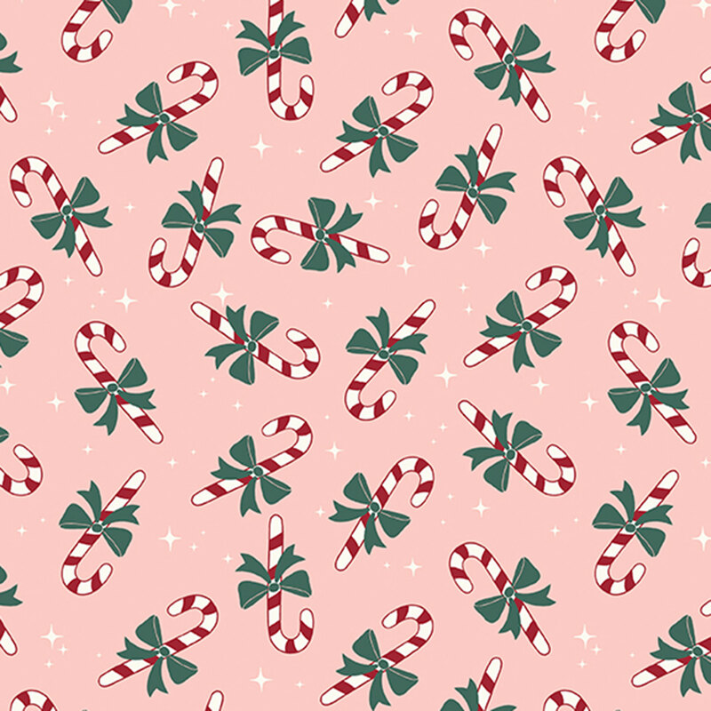 A blush pink fabric with tossed candy canes and white sparkles.  