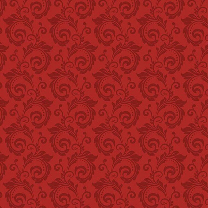 Tonal red fabric featuring a swirl pattern.