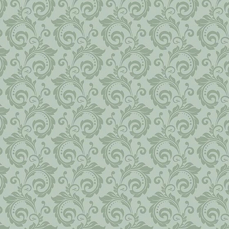 Tonal sage green fabric with a swirl pattern.
