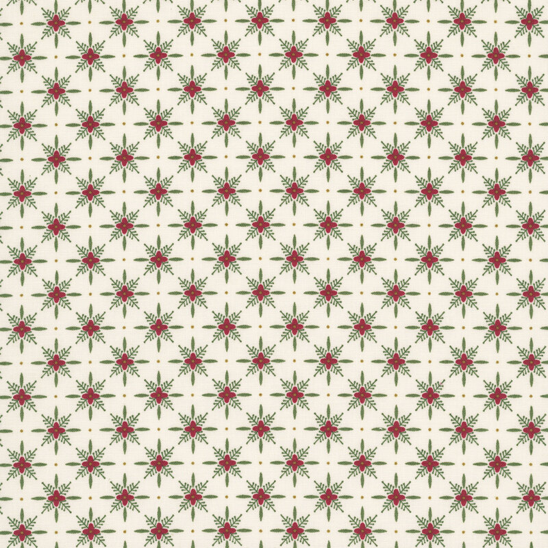 White fabric with a red and green pattern of geometric shapes in a lattice with florals. 