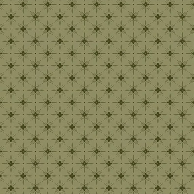 Sage green fabric with a dark pattern of geometric shapes in a lattice with florals. 