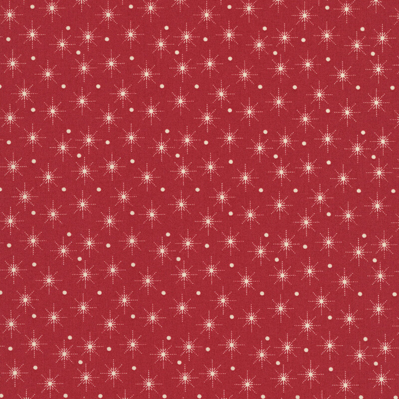 Red fabric with classic pattern of cream white dots and stars.