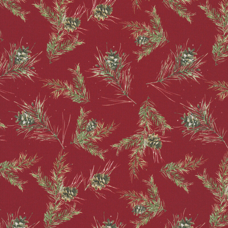 A red fabric with scattered realistic branches and pinecones. 