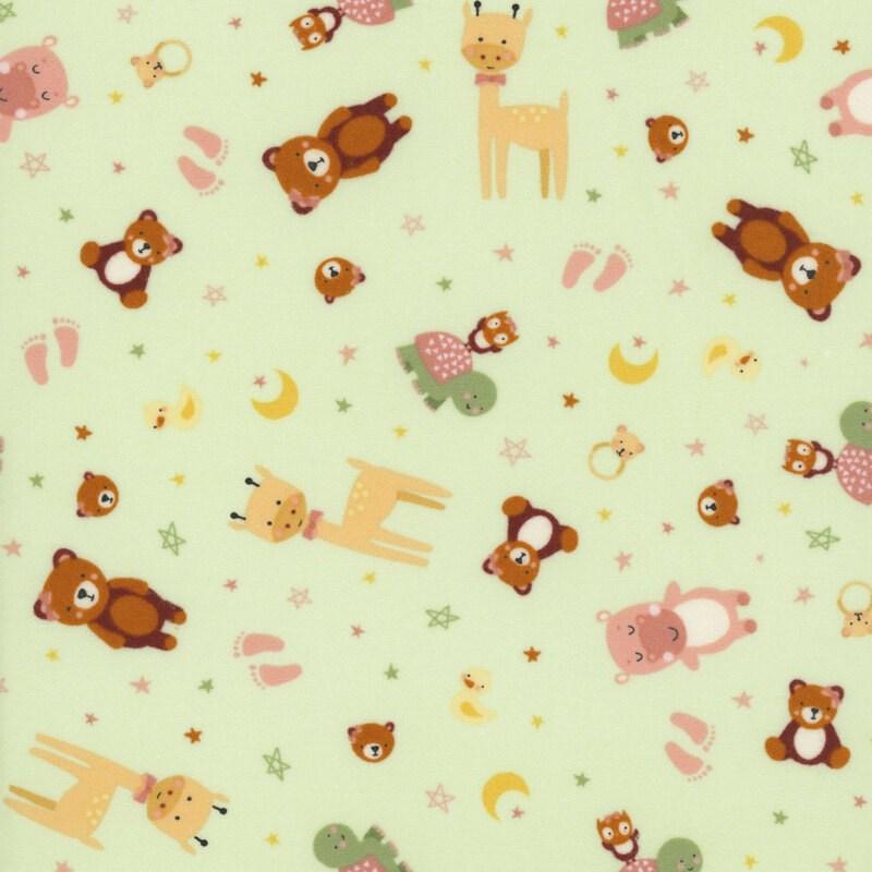 A pastel green fabric featuring tossed stylized animals, including teddy bears, hippos, giraffes, turtles, duckies, and owls. 