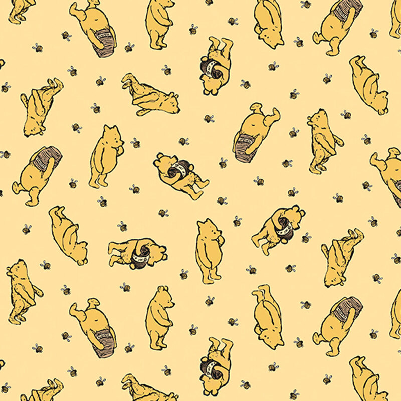 pale yellow flannel fabric tossed with Winnie the Pooh with a jar of honey surrounded by bees.