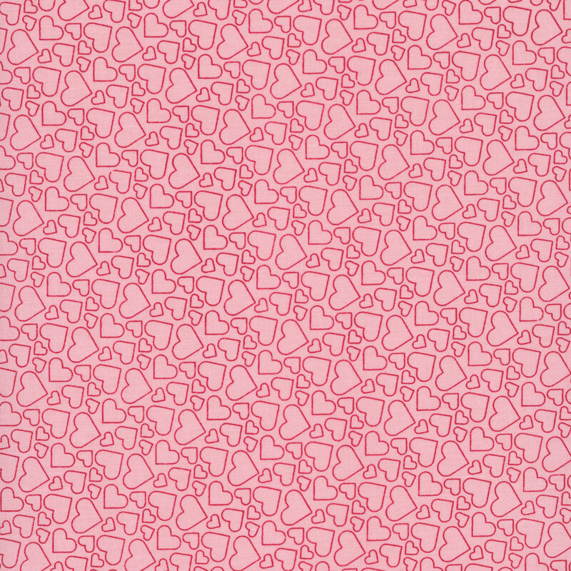 pink fabric with heart outlines in various sizes