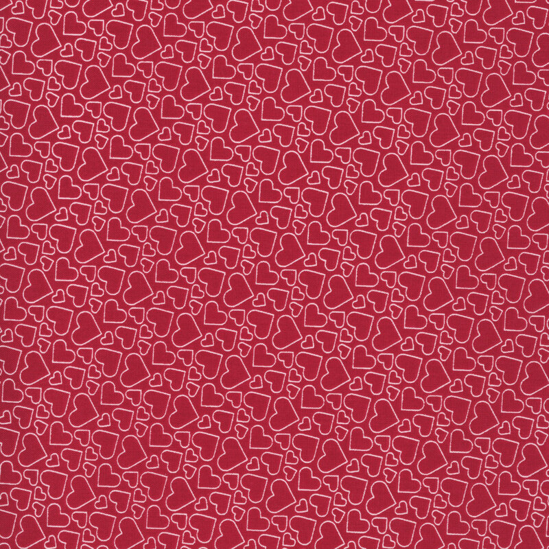 crimson red fabric with pink heart outlines in various sizes