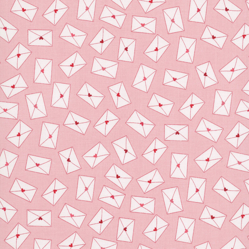 light pink fabric featuring scattered white envelopes sealed with dark red, crimson, and pink hearts.