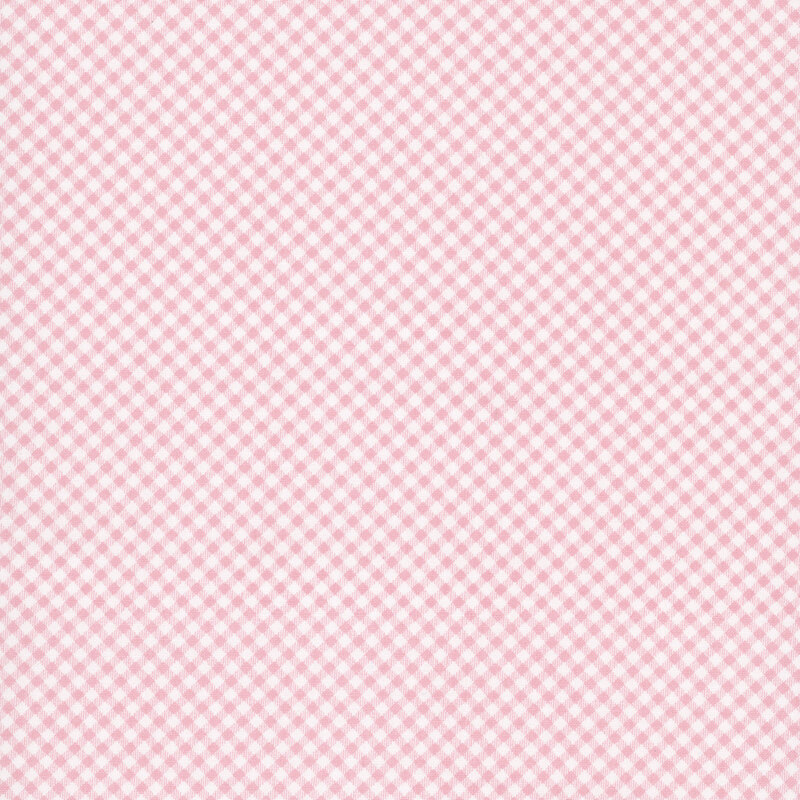 White fabric featuring a light pink gingham pattern