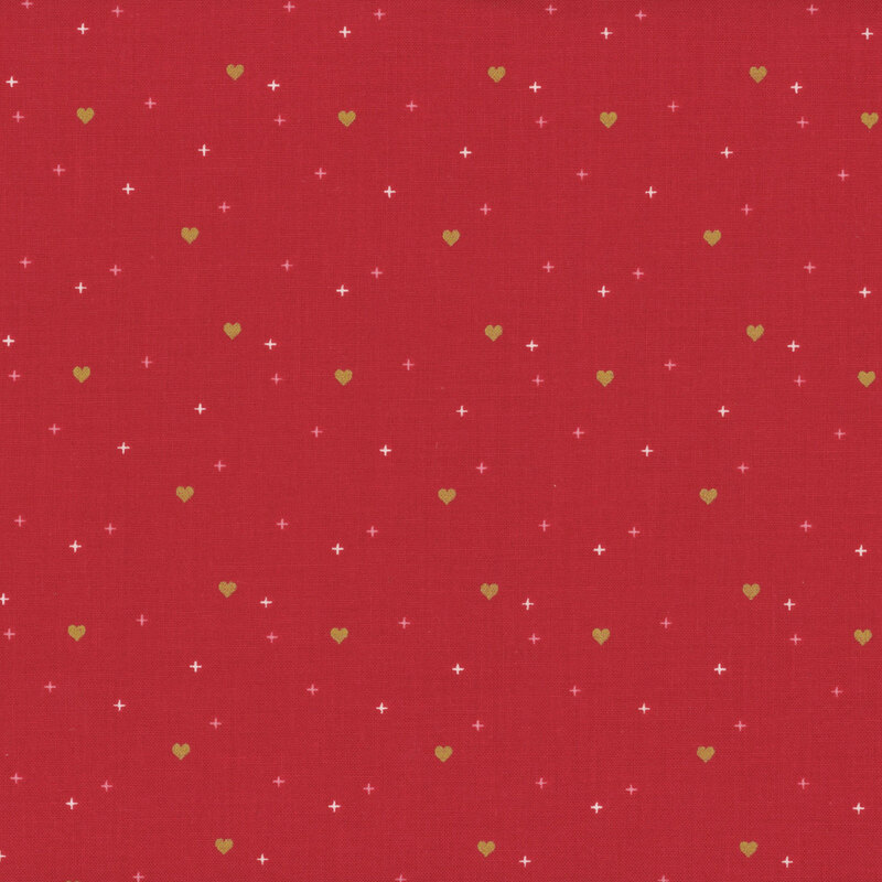 gold hearts scattered with white and pink crosses on red fabric