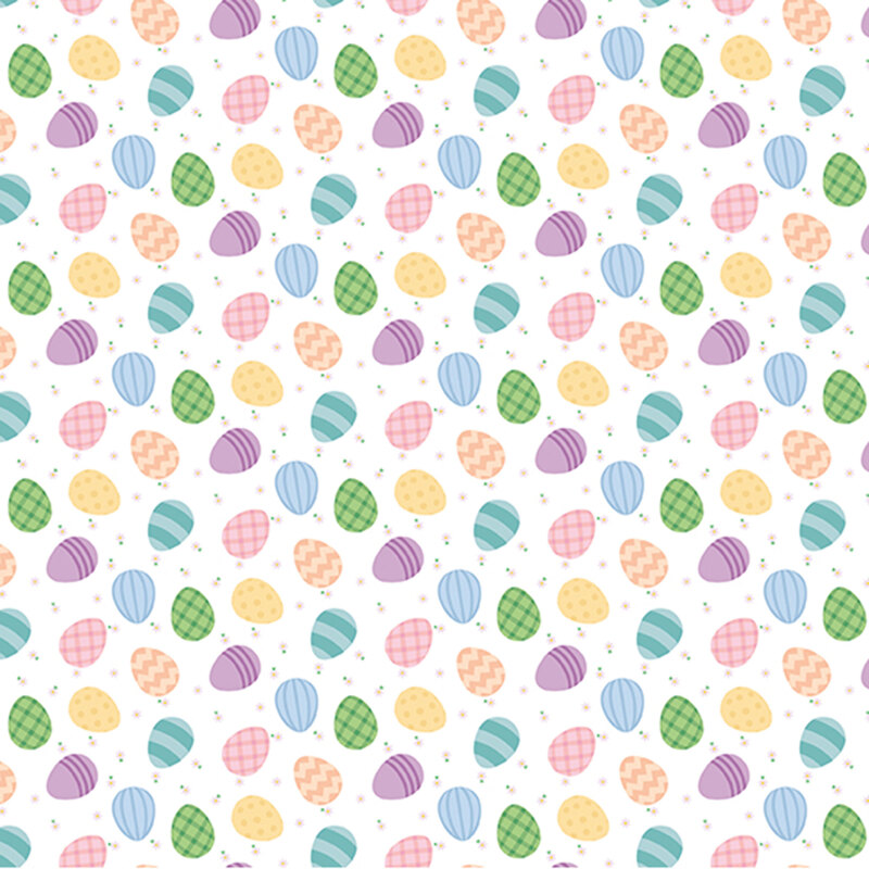 colorful easter eggs and pink flowers scattered on bright white fabric