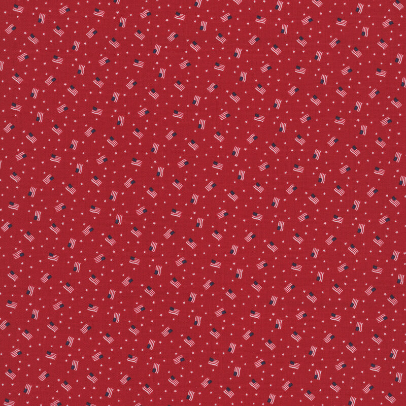 cherry red fabric tossed with American flags and small white stars