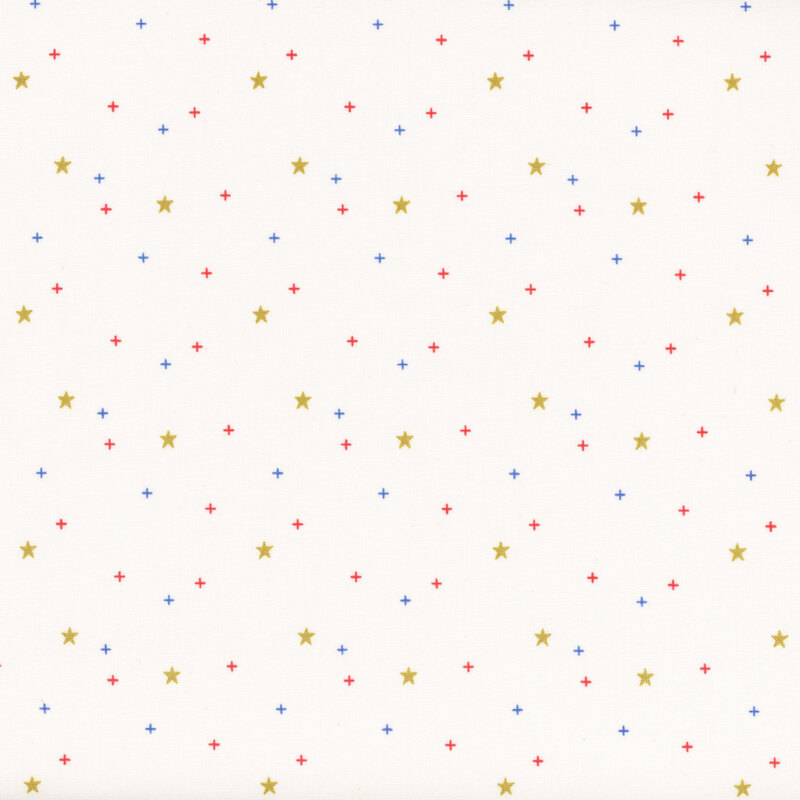 gold stars scattered with red and blue crosses on bright white fabric