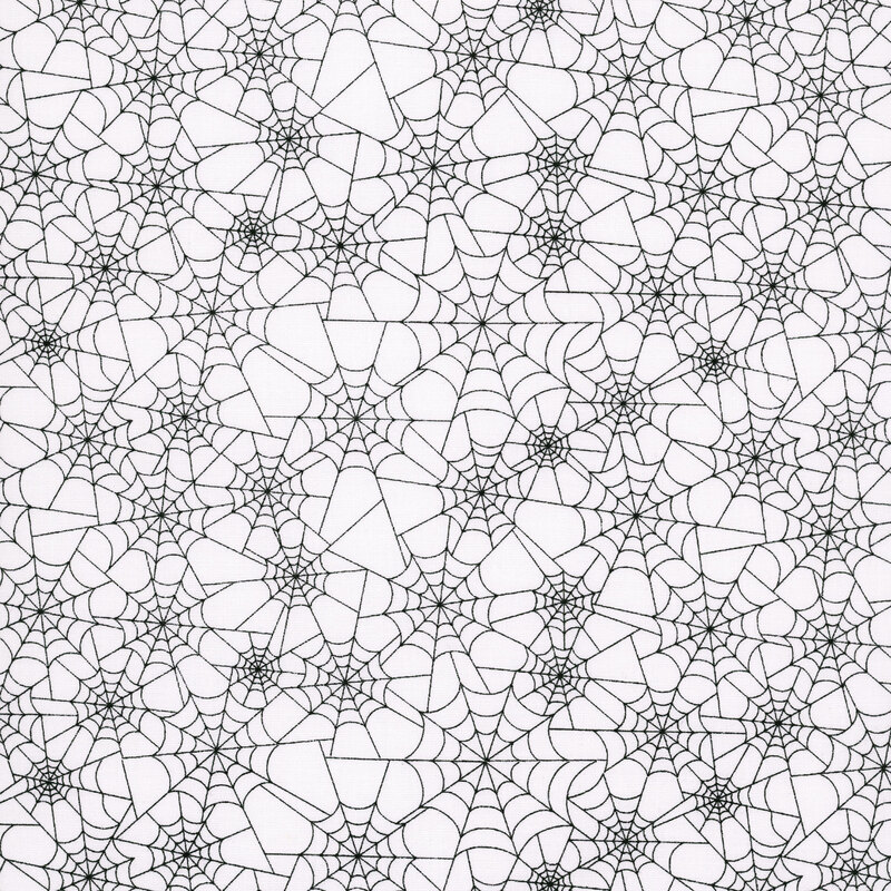 snow white fabric covered in black spider webs