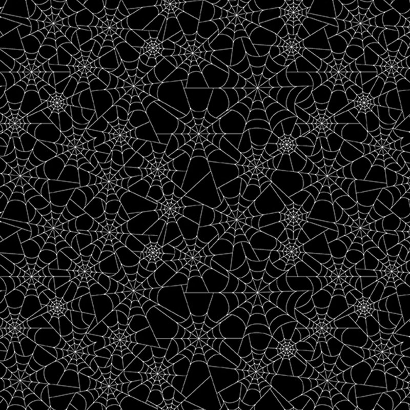 black fabric covered in glow in the dark white spider webs