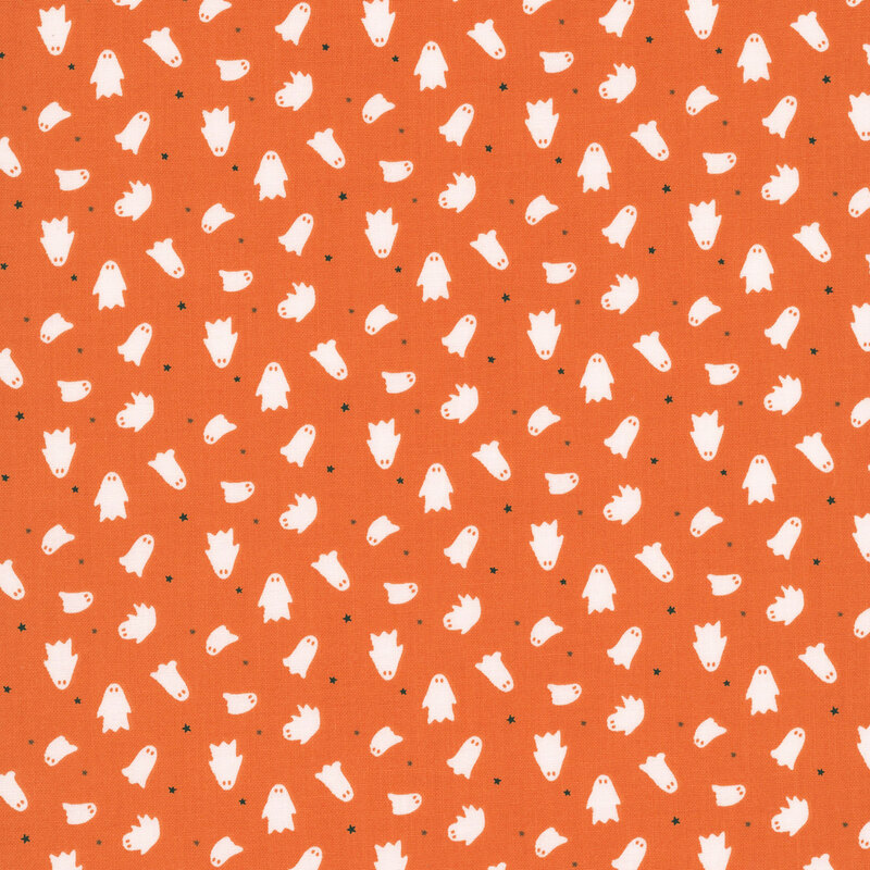 white ghosts and black and gray stars scattered on pumpkin orange fabric