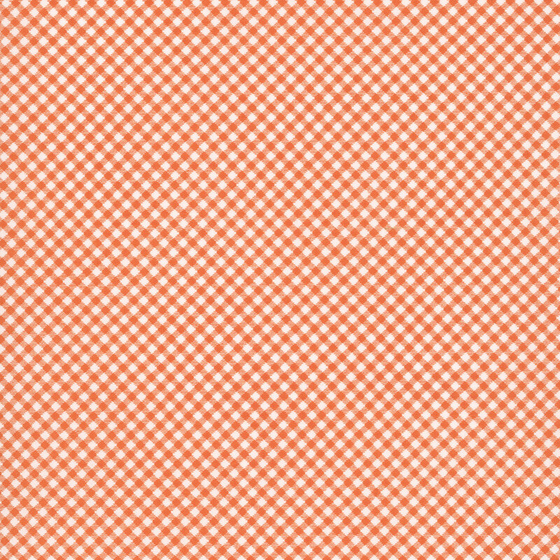 White fabric featuring a orange gingham pattern