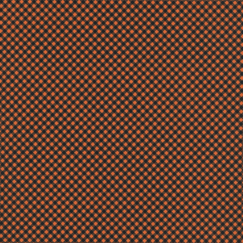 orange fabric featuring a black gingham pattern