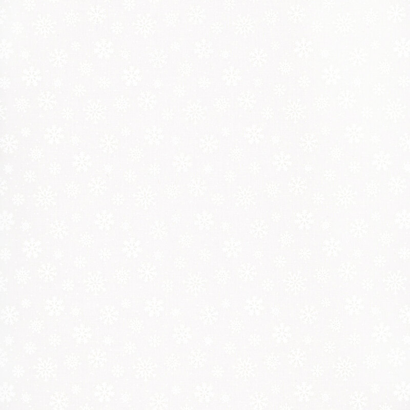 white on white fabric featuring snowflakes