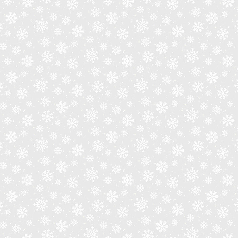 white on white fabric featuring snowflakes