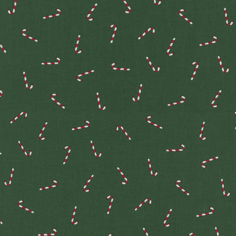 dark green fabric tossed with white and red candy canes