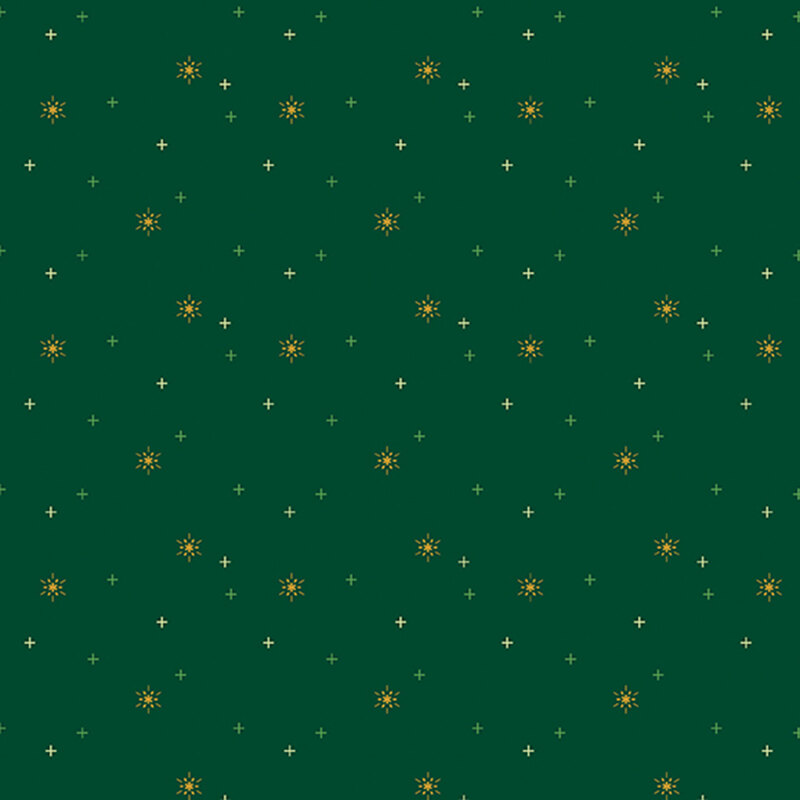 gold stars tossed with light and dark green crosses on hunter green fabric