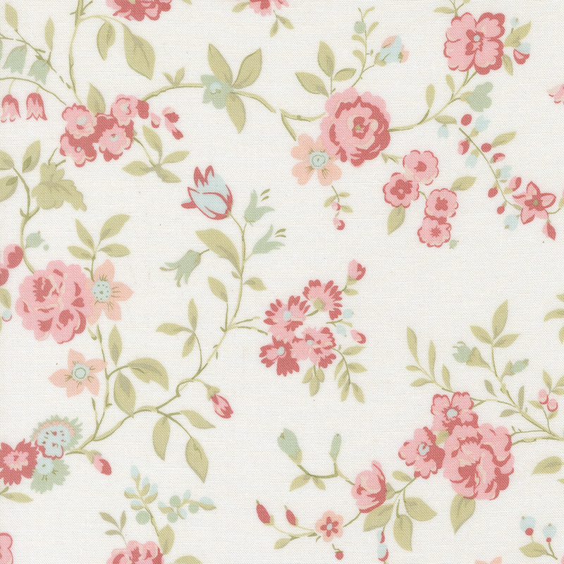 White fabric with a pattern of large pink and blue florals alongside green leaves.