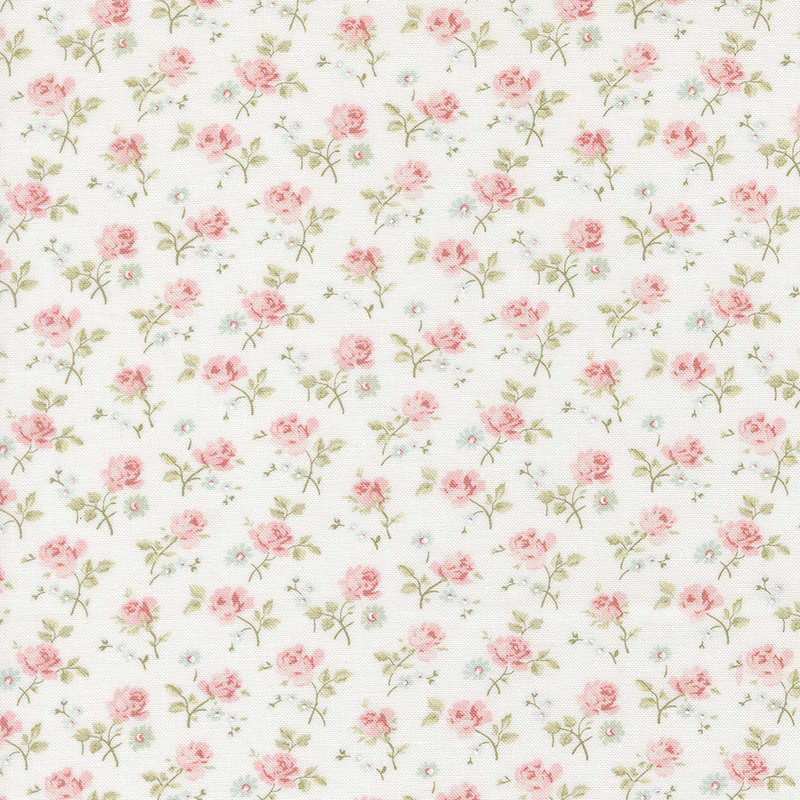white fabric with a dense pattern of tossed pink roses and assorted florals.