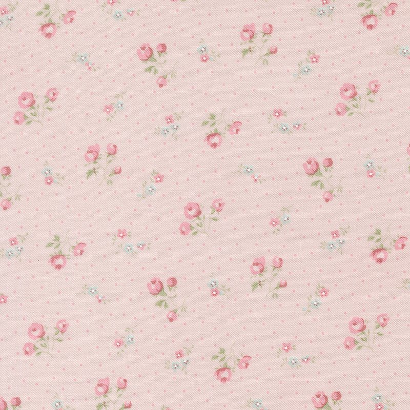 Pink fabric with a pattern of pindots and clusters of roses. 