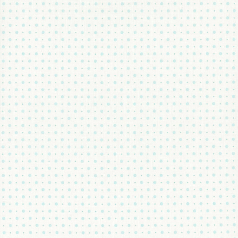 White fabric with a pattern of small and tiny light blue polka dots.
