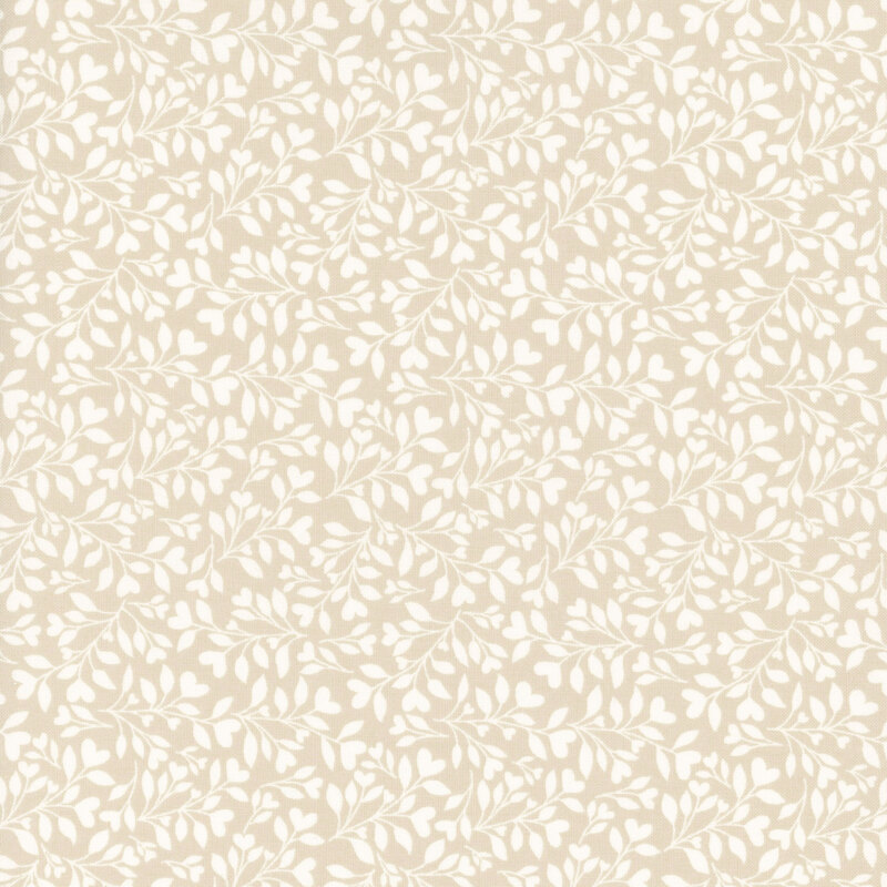 Beige fabric with a dense pattern of white leaves and vines accented with subtle hearts.