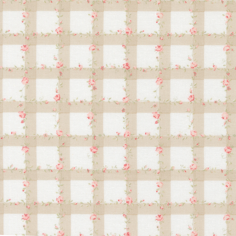 White fabric with a beige gingham pattern scattered with pink roses and green leaves.