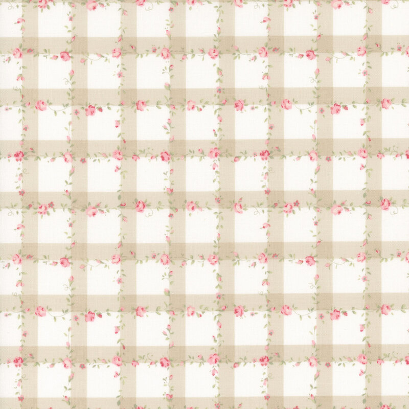 White fabric with a beige gingham pattern scattered with pink roses and green leaves.