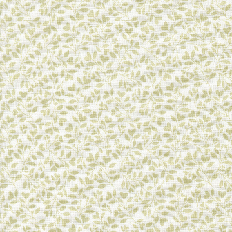 White fabric with a dense pattern of green leaves and vines accented with subtle hearts.