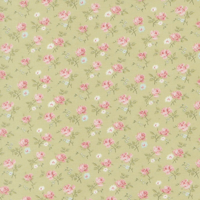 Green fabric with a dense pattern of tossed pink roses and assorted florals.