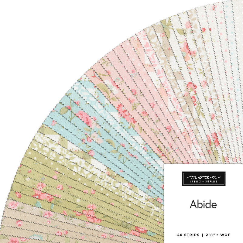 A fan of fabric strips in pastel colors and floral patterns with a label reading Abide.