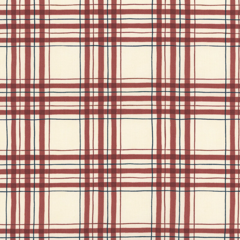 Cream fabric with a red and navy plaid pattern. 