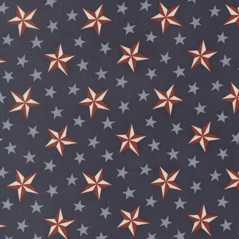 Navy blue fabric with a pattern of stylized stars in red, white, and blue.