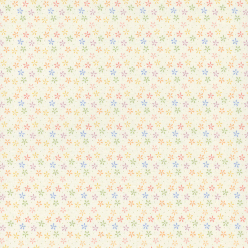 Cream fabric with tiny pastel flowers crowded together amongst pinprick dots.