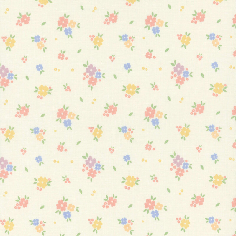 Cream fabric with tossed clusters of pastel yellow, pink, blue, and purple flowers.