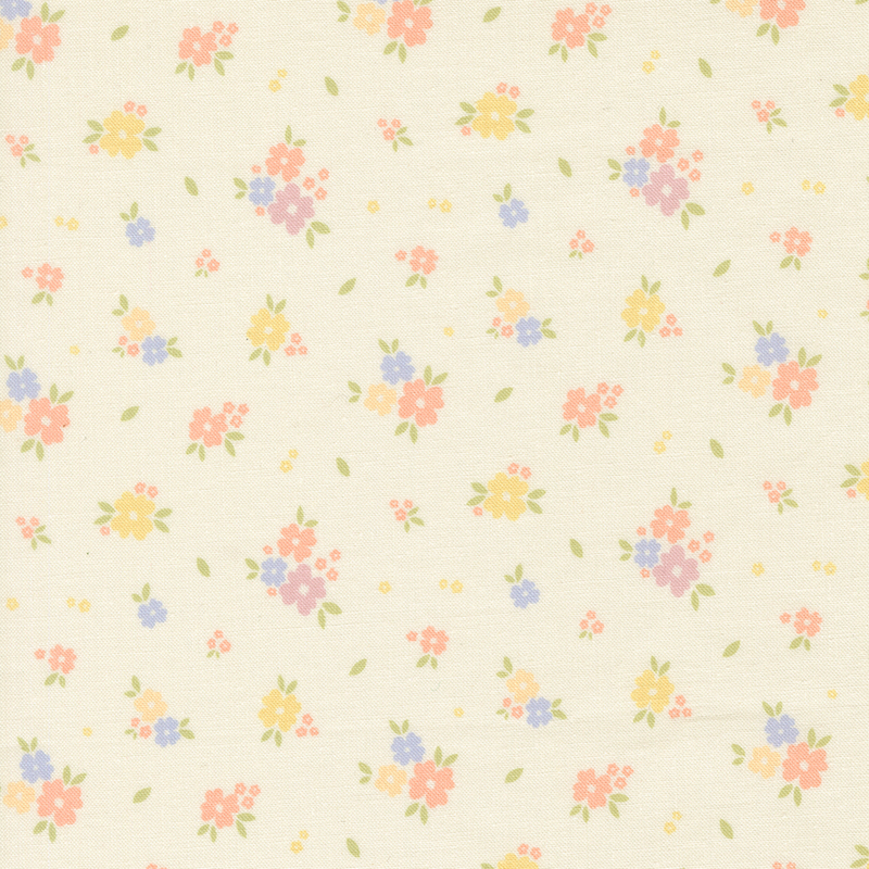 Cream fabric with tossed clusters of pastel yellow, pink, blue, and purple flowers.