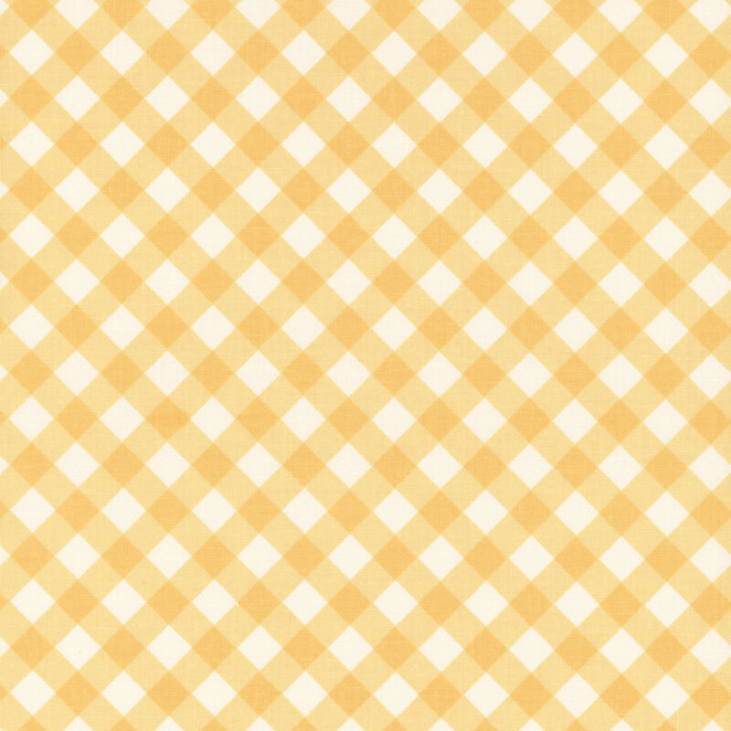 Fabric with a diagonal cream and yellow gingham design.