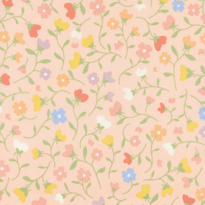 Peach pink fabric with a sprawling pastel floral and stem design with red, yellow, purple, blue, and pink petals.