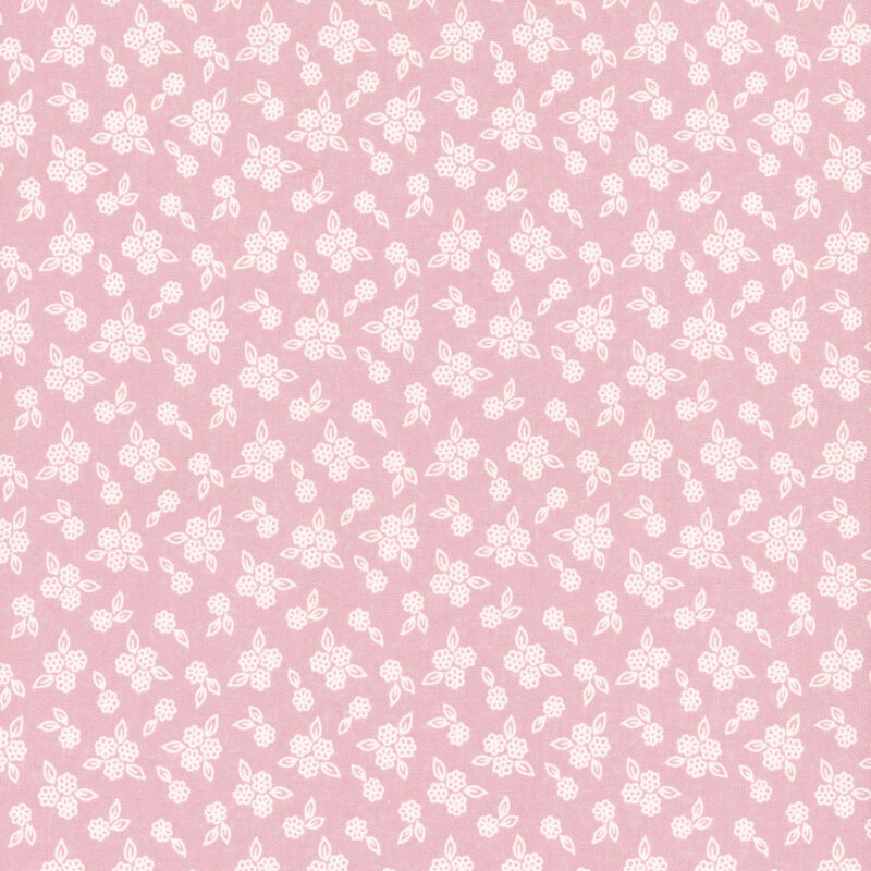 Muted rose-colored fabric with tossed clusters of outlined florals.