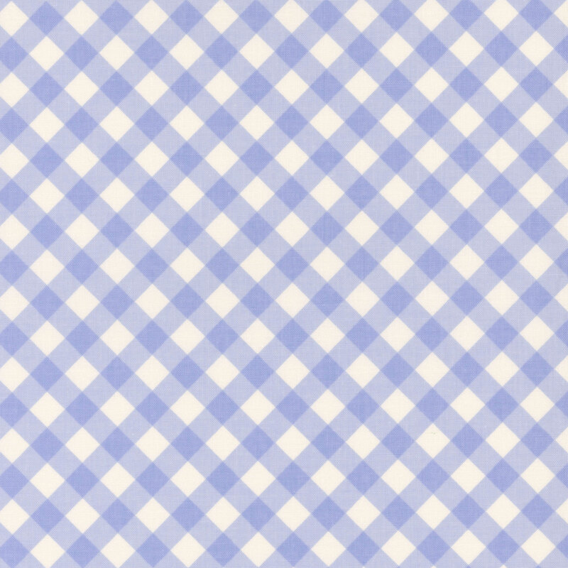 Fabric with a diagonal cream and purplish-blue gingham design.