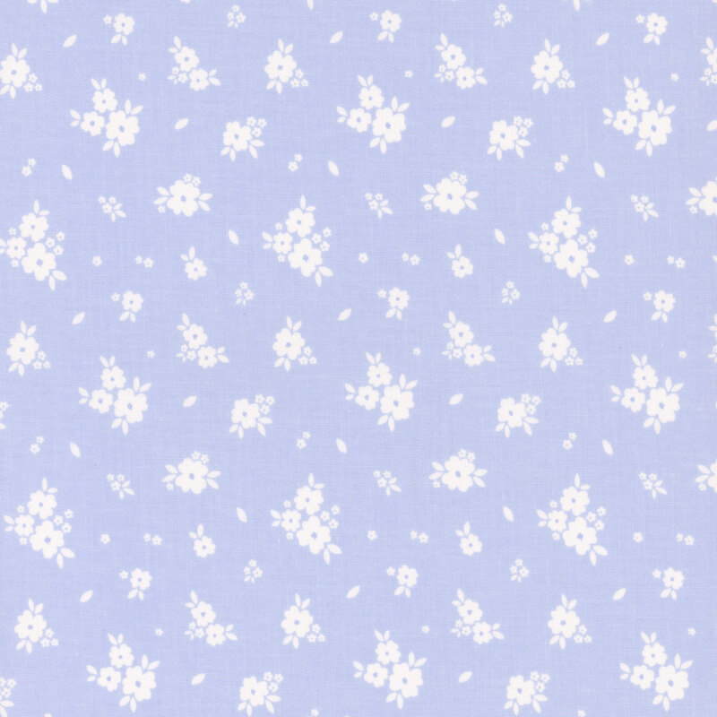 Bright purplish-blue fabric with tossed clusters of white flowers.