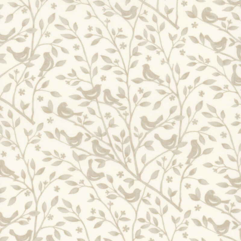 Cream fabric swatch with a tonal beige pattern of leafy branches with birds perched atop them.
